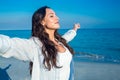 Happy woman with eyes closed at the beach Royalty Free Stock Photo