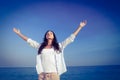 Happy woman with eyes closed at the beach Royalty Free Stock Photo