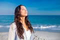 Happy woman with eyes closed at the beach Royalty Free Stock Photo