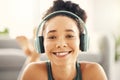 Happy woman, face and headphones listening to music on floor in yoga for relaxation in living room at home. Portrait Royalty Free Stock Photo