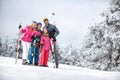 Happy woman with family making selfie in mountain Royalty Free Stock Photo