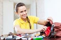 Happy woman found thing in handbag Royalty Free Stock Photo