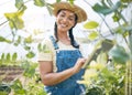 Happy, woman and gardening on tablet in greenhouse for agriculture, farming plants or eco supply chain. Farmer, digital