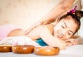 Happy Woman is getting her back scrub in Thai Spa treatment Royalty Free Stock Photo