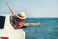 Happy woman girl goes to summer travel trip in   car Royalty Free Stock Photo