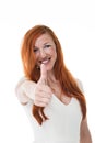 Happy woman giving a thumbs up gesture Royalty Free Stock Photo