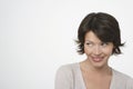 Happy Woman Glancing Sideways Royalty Free Stock Photo