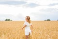 Happy woman in golden wheat Royalty Free Stock Photo