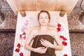 Happy woman in hammam or turkish bath in relax.