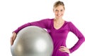 Happy Woman With Hand On Hip Holding Pilates Royalty Free Stock Photo