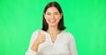 Happy woman, hand and thumbs up on green screen for agreement, winning or success against a studio background. Portrait Royalty Free Stock Photo