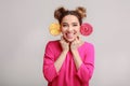 Happy woman having fun with lollipops over background Royalty Free Stock Photo