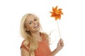 Happy woman having pinwheel Royalty Free Stock Photo