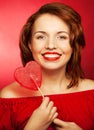 Happy woman with heart candy lolly pop Royalty Free Stock Photo