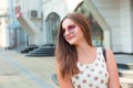 Happy woman in heart shaped sunglasses looking sideways Royalty Free Stock Photo