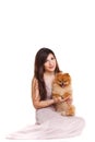 Happy woman and her beautiful little red dog spitz over white background close portrait Royalty Free Stock Photo