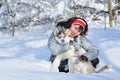 Happy woman and her Husky puppy