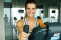 Happy woman during her workout in gym Royalty Free Stock Photo