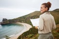 Happy woman hiker with map looking into the distance Royalty Free Stock Photo