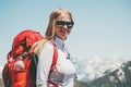 Happy Woman hiking in mountains with backpack Royalty Free Stock Photo