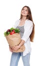 Happy woman hold bag with healthy food, grocery buyer isolated Royalty Free Stock Photo