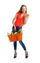 Happy woman holding a basket full of healthy food. Shopping Royalty Free Stock Photo
