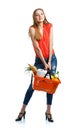 Happy woman holding a basket full of healthy food. Shopping Royalty Free Stock Photo