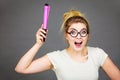 Happy woman holding big oversized pencil Royalty Free Stock Photo