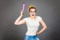 Happy woman holding big oversized pencil Royalty Free Stock Photo