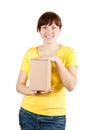 Happy woman holding cardboard box