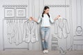 Happy woman holding clothes on hangers Royalty Free Stock Photo