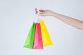 Happy woman holding colorful shopping bags with white background Royalty Free Stock Photo