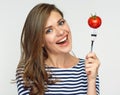 Happy woman holding fork with tomato Royalty Free Stock Photo