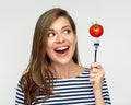 Happy woman holding fork with tomato. Royalty Free Stock Photo