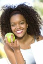 Happy Woman Holding Green Apple Royalty Free Stock Photo