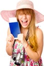 Happy woman is holding a passport with ticket