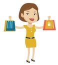 Happy woman holding shopping bags.