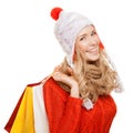 Happy woman holding shopping bags. Winter sales. Isolated. Royalty Free Stock Photo