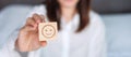 Happy Woman holding smile emotion face block. Customer choose Emoticon for user reviews. Service rating, mental health, positive Royalty Free Stock Photo