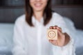 Happy Woman holding smile emotion face block. Customer choose Emoticon for user reviews. Service rating, mental health, positive Royalty Free Stock Photo