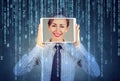Happy woman holding tablet with her face displayed on a screen Royalty Free Stock Photo