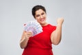 Happy woman holding thousands of money banknotes Royalty Free Stock Photo