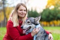 Happy woman hugging dog. pet adoption.  czechoslovak with female owner Royalty Free Stock Photo