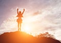 Happy woman jumping against beautiful sunset. Freedom, enjoyment concept Royalty Free Stock Photo