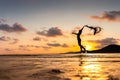 Happy woman jumping on the beach and water splash. Mountain, sea water and beautiful cloud is landscape Royalty Free Stock Photo