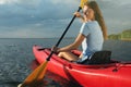 Happy woman kayaking on river. Summer activity Royalty Free Stock Photo