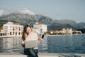 Happy Woman with laptop and credit card buying online sitting on Royalty Free Stock Photo