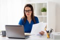 Happy woman with laptop working at home or office Royalty Free Stock Photo