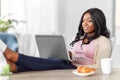 Happy woman with laptop working at home office Royalty Free Stock Photo