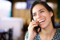 Happy woman laughing calling on phone in a restaurant Royalty Free Stock Photo